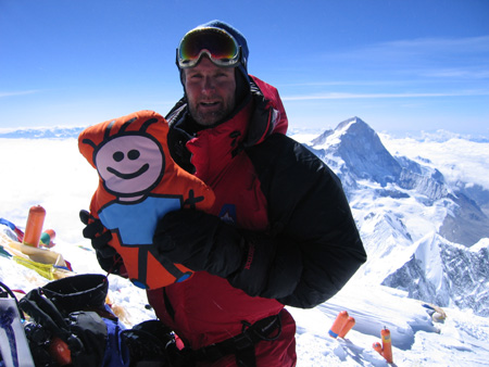 Image: Tony with the Red Cross mascot at the summit