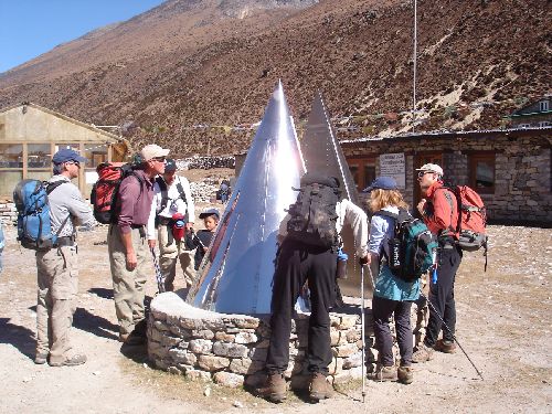 Image: Team examines monument to Everest's dead
